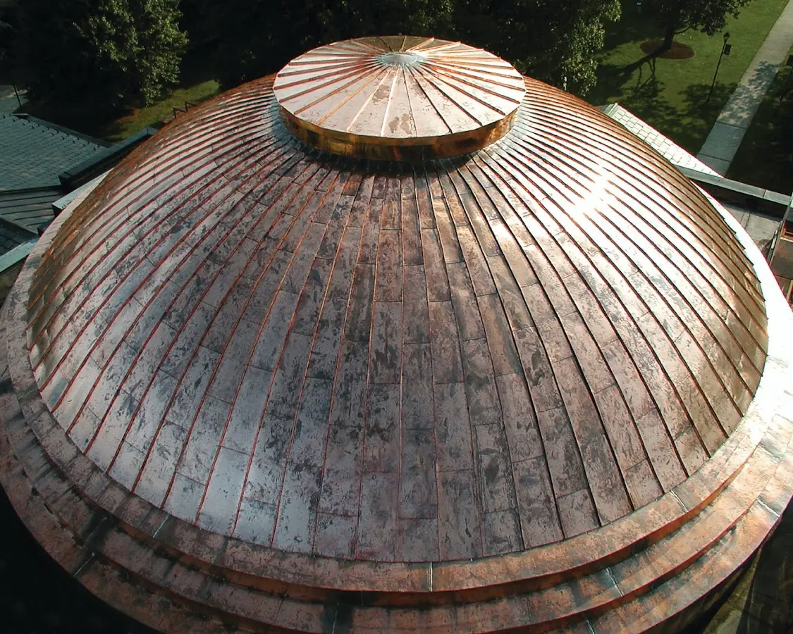 Craftsman Roofing crew installing a new roof in Quaker Gardens